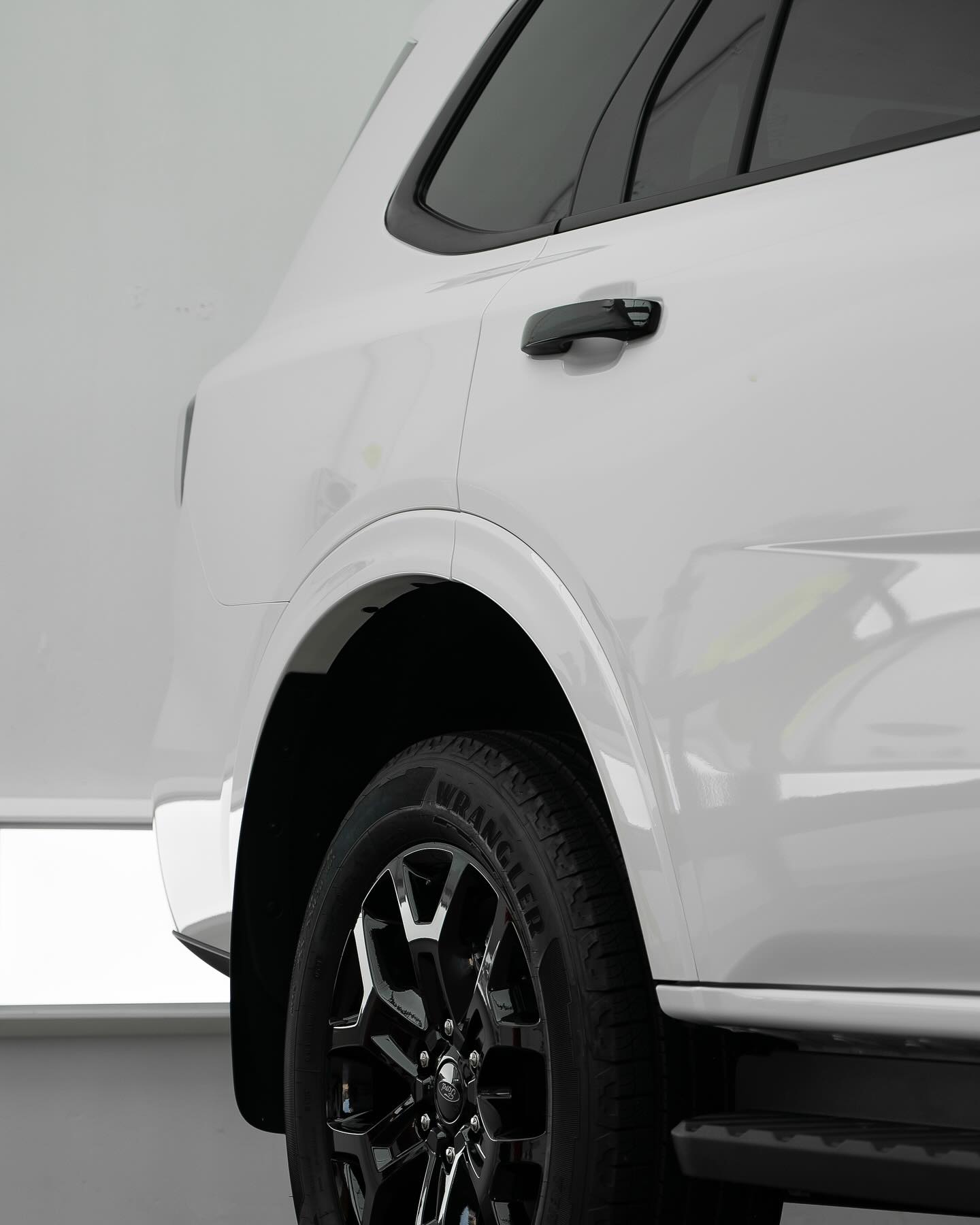 Accredited installer refining paintwork at our Arundel ccpx-studio