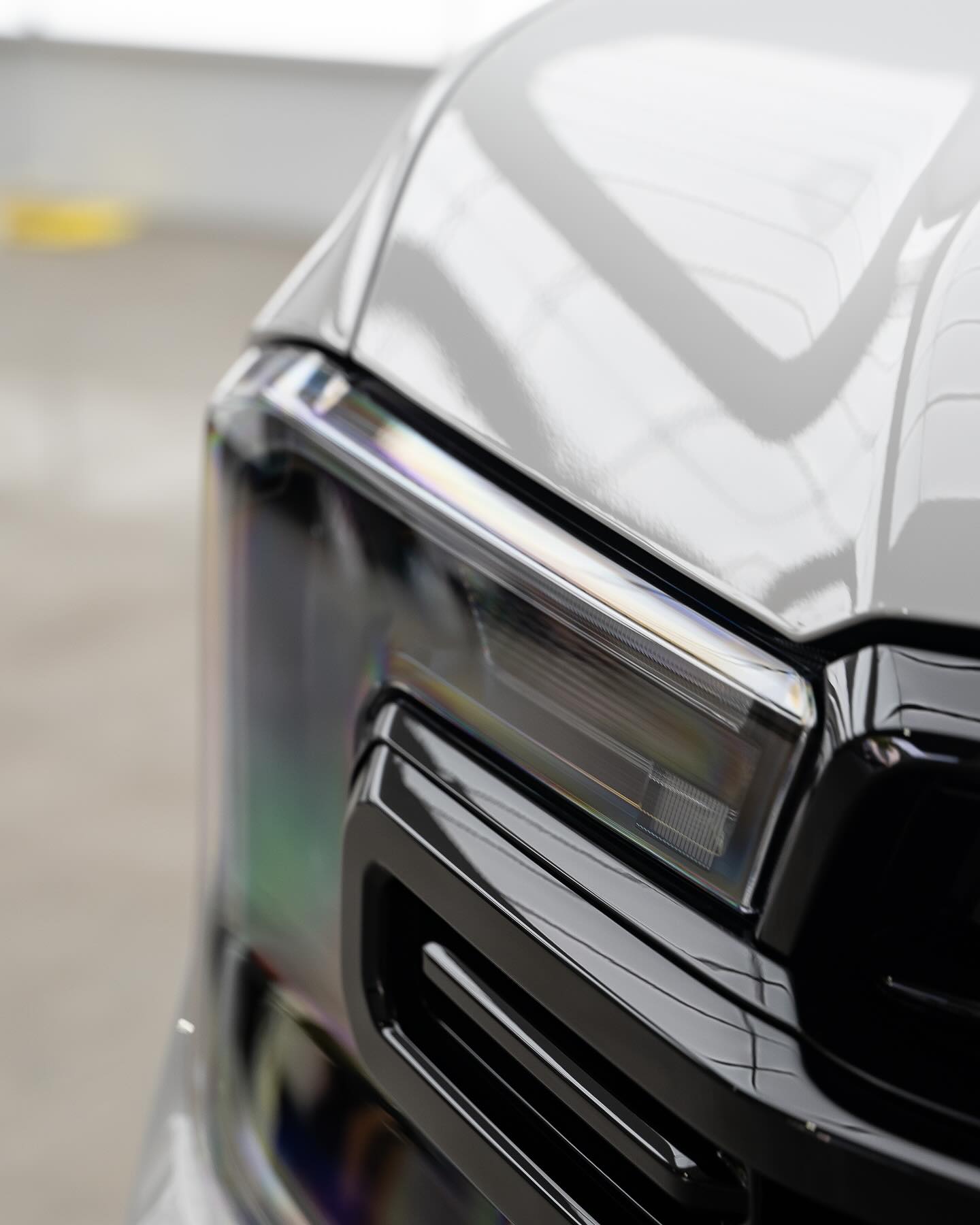 Corrected paintwork inspected under specialist lighting before handover