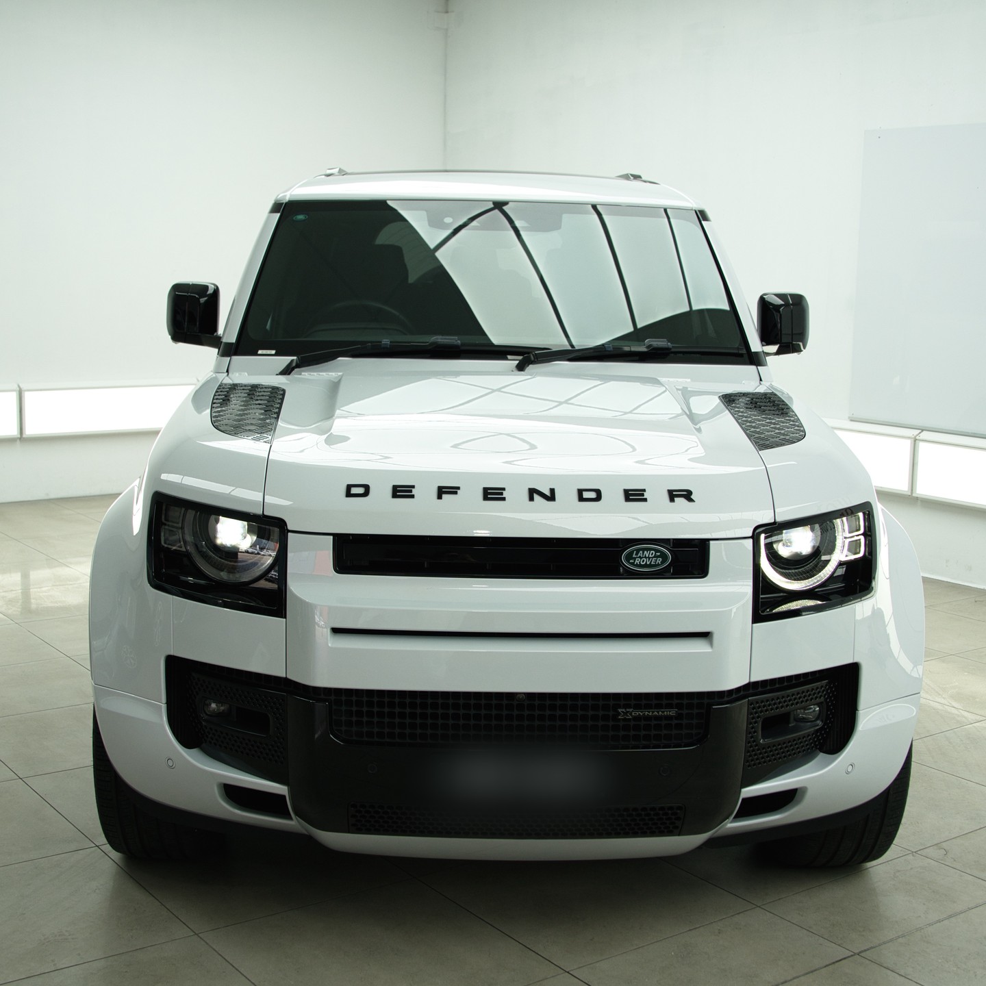 Ceramic coating bonding to a vehicle's factory paintwork